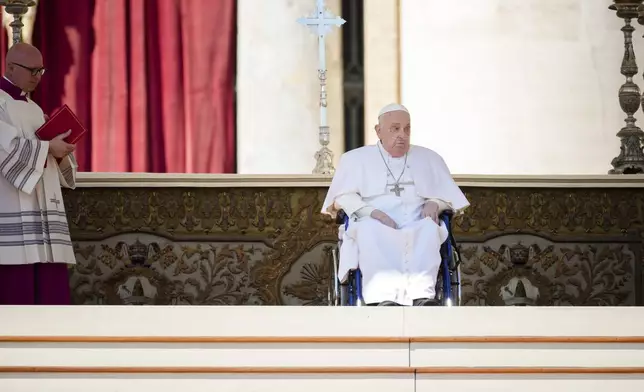 Pope Francis arrives in a wheelchair at the end of a mass in St. Peter's Square at The Vatican, Sunday, April 6, 2025, part of the Jubilee of the sick and the health workers. (AP Photo/Andrew Medichini)
