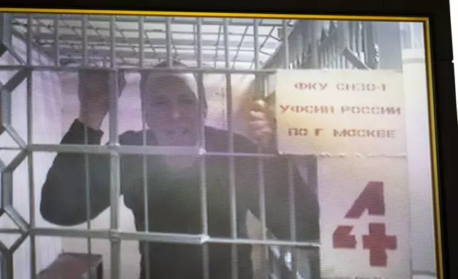 FILE - U.S. citizen Joseph Tater, who was detained for 15 days on charges of minor disorderly conduct in mid-August and then detained for a further two months on charges of attacking a police officer, is seen in a video link provided by the Russian Federal Penitentiary Service in the Moscow's City Court in Russia on Sept. 26, 2024. (AP Photo/Alexander Zemlianichenko, File)
