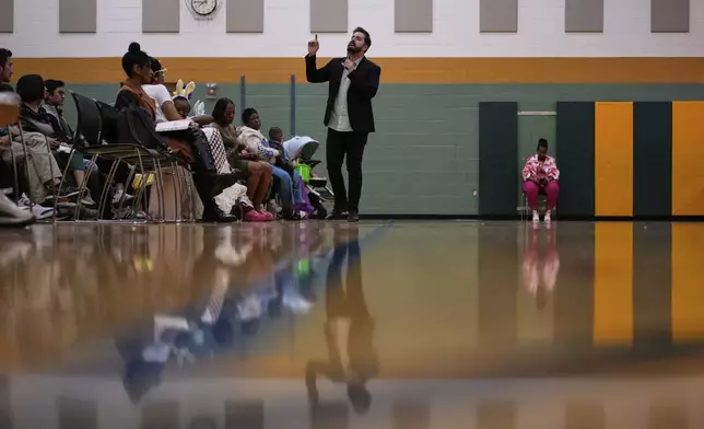 River Church Cincinnati pastor Cory Bowman, who is Vice President JD Vance's half brother and Cincinnati mayoral candidate, preaches during Easter worship service in the Hays Porter Elementary School gym Sunday, April 20, 2025, in Cincinnati. (AP Photo/Carolyn Kaster)