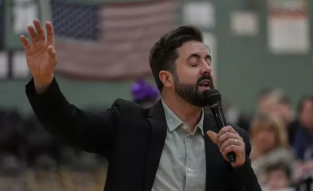 River Church Cincinnati pastor Cory Bowman, who is Vice President JD Vance's half brother and Cincinnati mayoral candidate, preaches during Easter worship service in the Hays Porter Elementary School gym Sunday, April 20, 2025, in Cincinnati. (AP Photo/Carolyn Kaster)