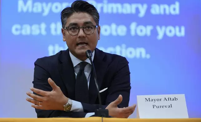 Incumbent Cincinnati Mayor Aftab Pureval participates in candidate forum with Brian Frank hosted by the Cincinnati NAACP, Tuesday, April 15, 2025, in Cincinnati. (AP Photo/Carolyn Kaster)