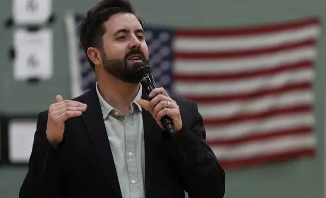 River Church Cincinnati pastor Cory Bowman, who is Vice President JD Vance's half brother and Cincinnati mayoral candidate, preaches during Easter worship service in the Hays Porter Elementary School gym Sunday, April 20, 2025, in Cincinnati. (AP Photo/Carolyn Kaster)