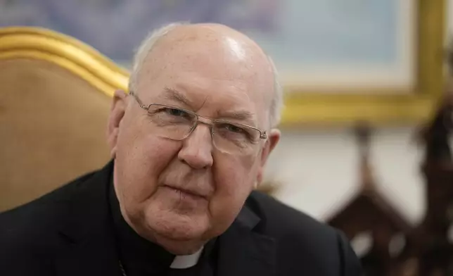 FILE - Cardinal Kevin Farrell attends an interview with The Associated Press in Rome, June 30, 2022. (AP Photo/Andrew Medichini, File)