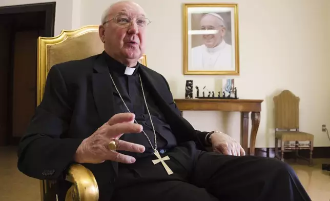 FILE - Cardinal Kevin Farrell, head of the Vatican's family and laity office, speaks during an interview with The Associated Press in Rome, July 31, 2018. (AP Photo/Paolo Santalucia, File)
