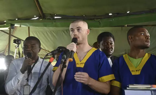 FILE - Tyler Thompson Jr, addresses the court in Kinshasa with 52 other defendants Friday June 7, 2024, accused of a role in last month's attempted coup in Congo, led by little-known opposition figure Christian Malanga, in which six people were killed. (AP Photo/Samy Ntumba Shambuyi, file)
