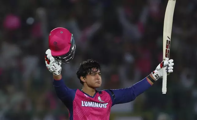 Rajasthan Royals' Vaibhav Suryavanshi celebrates after scoring a century during the Indian Premier League cricket match between Rajasthan Royals and Gujarat Titans at Sawai Mansingh Stadium in Jaipur, India, Monday, April 28, 2025. (AP Photo/Surjeet Yadav)