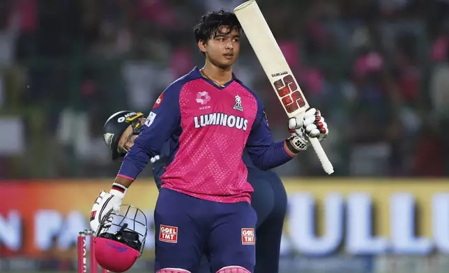 Rajasthan Royals' Vaibhav Suryavanshi celebrates after scoring a century during the Indian Premier League cricket match between Rajasthan Royals and Gujarat Titans at Sawai Mansingh Stadium in Jaipur, India, Monday, April 28, 2025. (AP Photo/Surjeet Yadav)
