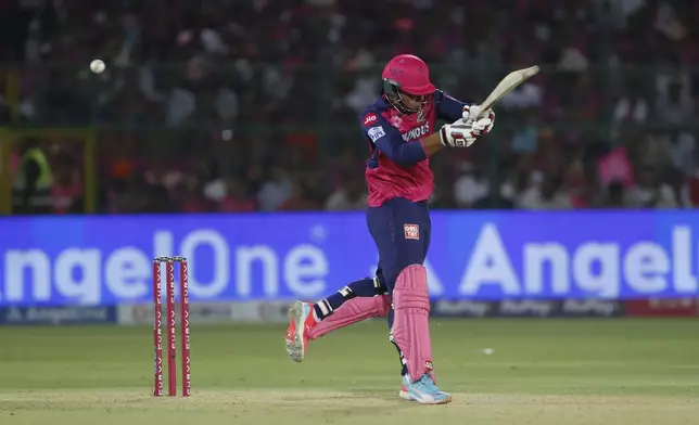 Rajasthan Royals' Vaibhav Suryavanshi plays a shot during the Indian Premier League cricket match between Rajasthan Royals and Gujarat Titans at Sawai Mansingh Stadium in Jaipur, India, Monday, April 28, 2025. (AP Photo/Surjeet Yadav)