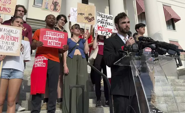 Logan Rubenstein, a 21-year-old junior at Florida State University, speaks at a rally in support of gun control policies on the steps of Florida's historic old capitol on Wednesday, April 23, 2025 in Tallahassee, Fla., less than a week after a deadly shooting on FSU's campus. Rubenstein is also a graduate of Marjory Stoneman Douglas High School in Parkland, Fla., where 17 people were killed in 2018 in what is considered one of the country's deadliest mass shootings. (AP Photo/Kate Payne)