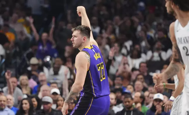 Los Angeles Lakers' Luka Doncic follows through on a shot in the first half of an NBA basketball game against the Dallas Mavericks in Dallas, Wednesday, April 9, 2025. (AP Photo/LM Otero)