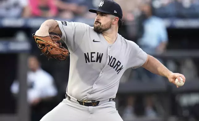 New York Yankees pitcher Carlos Rodón delivers to the Tampa Bay Rays during the first inning of a baseball game Friday, April 18, 2025, in Tampa, Fla. (AP Photo/Chris O'Meara)
