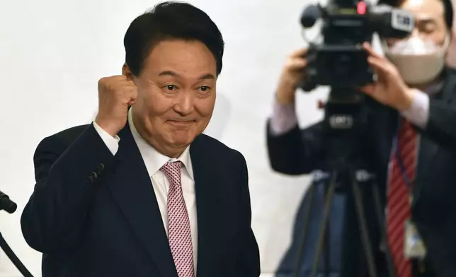 FILE - South Korea's president-elect Yoon Suk Yeol attends a ceremony to disband a presidential election camp at the National Assembly Library in Seoul, South Korea, on March 10, 2022. (Song Kyung-seok/Pool Photo via AP, File)