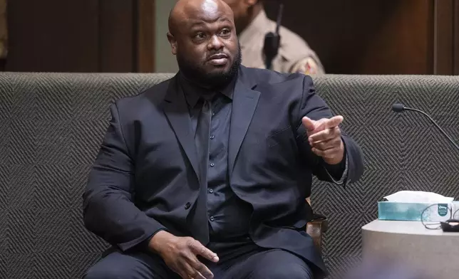 Desmond Mills Jr., a former Memphis Police Department officer who has taken a plea deal, identifies former MPD officer and defendant Tadarrius Bean during the second day of the state trial for the death of Tyre Nichols at 201 Poplar in Memphis, Tenn., on Tuesday, April 29, 2025. (Chris Day/Commercial Appeal/USA Today Network via AP, Pool)