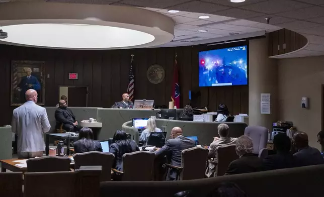 Desmond Mills Jr., a former Memphis Police Department officer who has taken a plea deal, second from left, identifies officers in body camera footage of the traffic stop of Tyre Nichols during the second day of the state trial for the death of Nichols at 201 Poplar in Memphis, Tenn., on Tuesday, April 29, 2025. (Chris Day/Commercial Appeal/USA Today Network via AP, Pool)