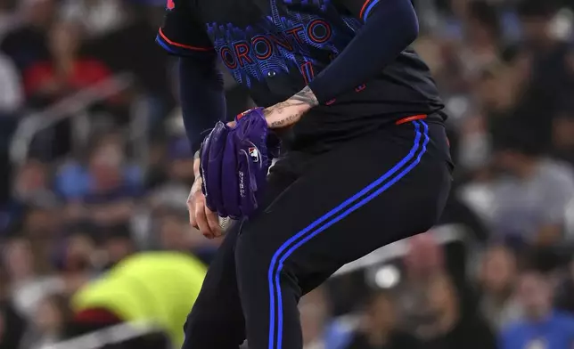 Toronto Blue Jays starting pitcher Bowden Francis (44) throws to a Seattle Mariners batter in the first inning of a baseball game in Toronto on Friday, April 18, 2025. (Jon Blacker/The Canadian Press via AP)