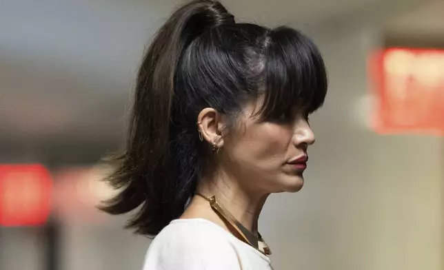 Tarale Wulff enters court following a break during Harvey Weinstein's retrial at Manhattan criminal court, Wednesday, April 23, 2025, in New York. (AP Photo/Julia Demaree Nikhinson)