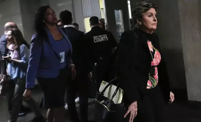 Attorney Gloria Allred leaves court for a break during Harvey Weinstein's retrial at Manhattan criminal court, Wednesday, April 23, 2025, in New York. (AP Photo/Julia Demaree Nikhinson)