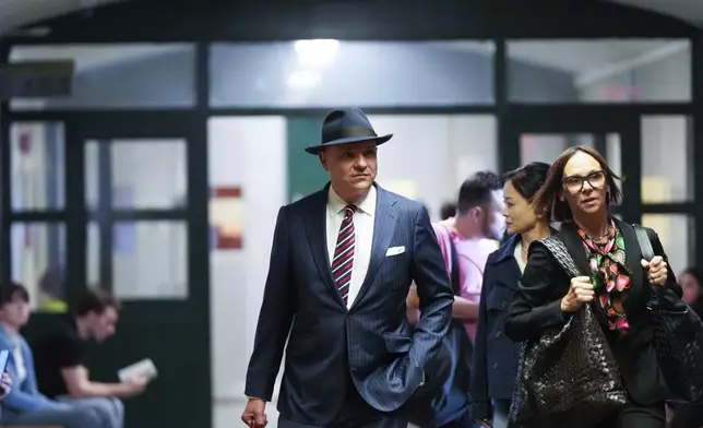 Attorney Arthur Aidala, lead attorney for Harvey Weinstein, center, arrives at Manhattan criminal court for Weinstein's retrial, Wednesday, April 23, 2025, in New York. (AP Photo/Julia Demaree Nikhinson)