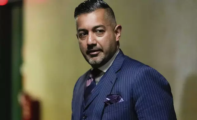 Attorney Imran Ansari leaves court for a break during Harvey Weinstein's retrial at Manhattan criminal court, Wednesday, April 23, 2025, in New York. (AP Photo/Julia Demaree Nikhinson)