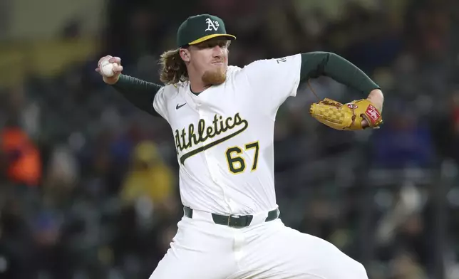 Athletics pitcher Grant Holman (67) throws a pitch to a Texas Rangers batter during the eighth inning of a baseball game Thursday, April 24, 2025, in West Sacramento, Calif. (AP Photo/Scott Marshall)