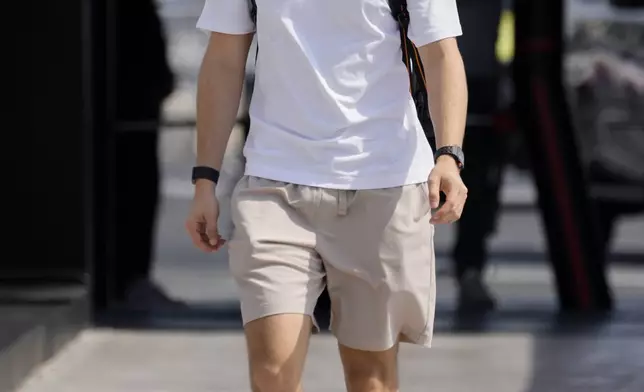 McLaren driver Oscar Piastri of Australia walks through the paddock ahead of the Formula One Saudi Arabian Grand Prix at the Jeddah Corniche Circuit in Jeddah, Saudi Arabia, Thursday, April 17, 2025. (AP Photo/Darko Bandic)