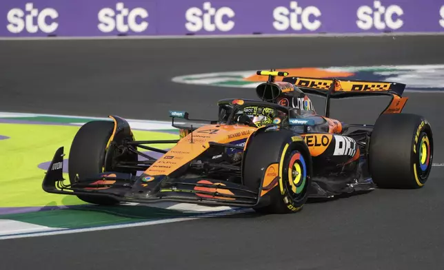 McLaren driver Lando Norris of Britain steers his car during the first free practice ahead of the Formula One Saudi Arabian Grand Prix at the Jeddah Corniche Circuit in Jeddah, Saudi Arabia, Friday, April 18, 2025. (AP Photo/Altaf Qadri)