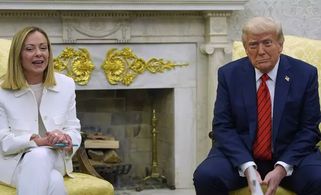 President Donald Trump meets with Italy's Prime Minister Giorgia Meloni in the Oval Office of the White House, Thursday, April 17, 2025, in Washington. (AP Photo/Alex Brandon)