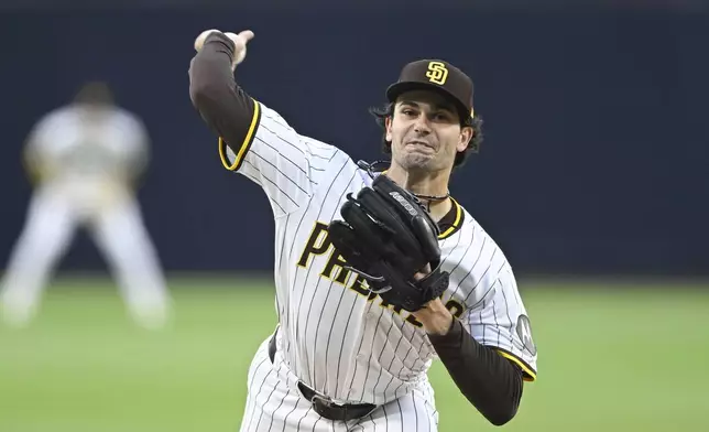 San Diego Padres starting pitcher Dylan Cease delivers during the first inning of a baseball game against the Chicago Cubs, Monday, April 14, 2025, in San Diego, Calif. (AP Photo/Denis Poroy)