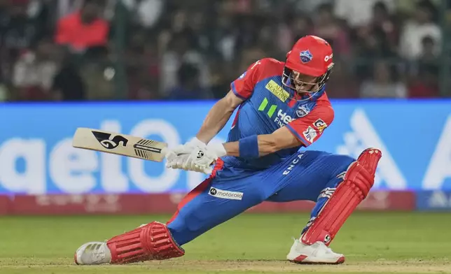 Delhi Capitals' Tristan Stubbs plays a shot during the Indian Premier League cricket match between Royal Challengers Bengaluru and Delhi Capitals at Chinnaswamy Stadium in Bengaluru, India, Thursday, April 10, 2025. (AP Photo/Aijaz Rahi)