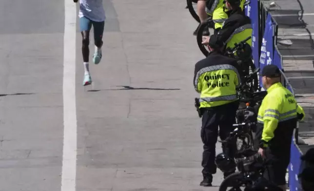 Boston Marathon winner John Korir, of Kenya, approaches the finish line to win the race, Monday, April 21, 2025, in Boston. (AP Photo/Charles Krupa)