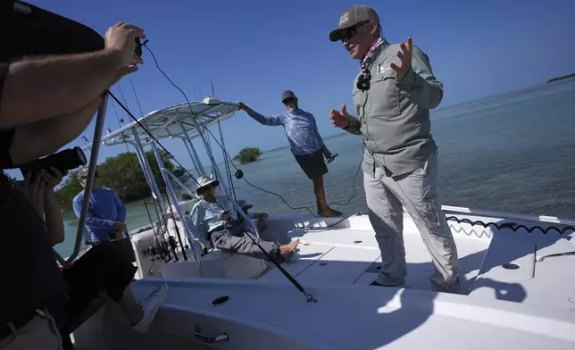 Steve Davis, chief science officer with The Everglades Foundation, talks to journalists during a media visit to Florida Bay organized by The Everglades Foundation, near Islamorada, Fla., Monday, April 7, 2025. (AP Photo/Rebecca Blackwell)