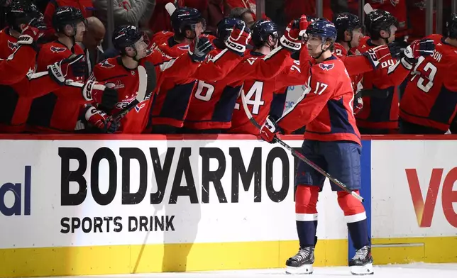 Washington Capitals center Dylan Strome (17) celebrates his goal in the second period of Game 2 of a first-round NHL hockey playoff series against the Montreal Canadiens Wednesday, April 23, 2025, in Washington. (AP Photo/Nick Wass)