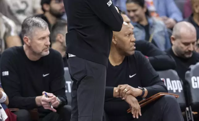 Denver Nuggets Head Coach David Adelman watches the team on defense during the first half of an NBA basketball game against the Sacramento Kings Wednesday, April 9, 2025, in Sacramento, Calif. (AP Photo/Sara Nevis)