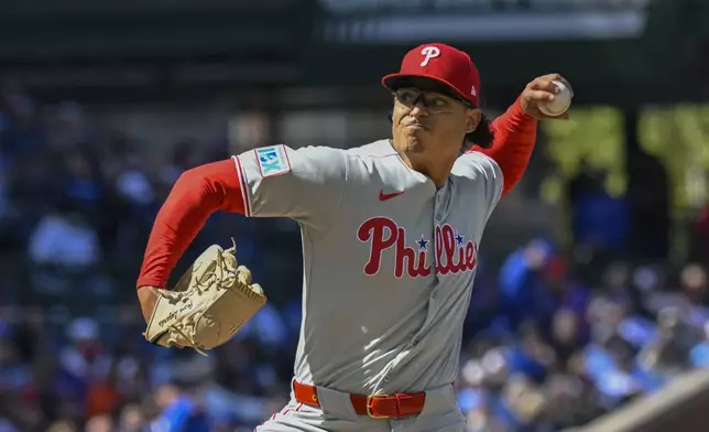 Philadelphia Phillies pitcher Jesús Luzardo delivers during the first inning of a baseball game against the Chicago Cubs, Saturday, April 26, 2025, in Chicago. (AP Photo/Matt Marton)