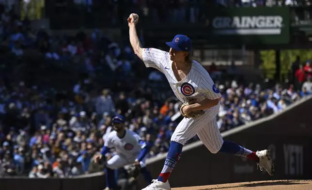 Chicago Cubs pitcher Ben Brown (32) delivers during the first inning of a baseball game against the Philadelphia Phillies, Saturday, April 26, 2025, in Chicago. (AP Photo/Matt Marton)