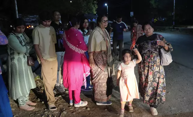 Indian tourists who were stuck on the road heading to Pahalgam leave after police ordered them to vacate the area, following an incident where assailants indiscriminately opened fire on tourists visiting Pahalgam in Indian controlled Kashmir, Tuesday, April 22, 2025.(AP Photo/Dar Yasin)