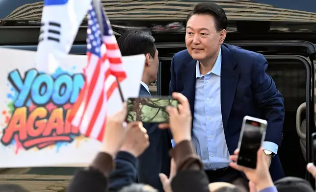 South Korea's ousted president Yoon Suk Yeol leaves his official residence in Seoul, South Korea, Friday, April 11, 2025. (Song Kyung Seok/Pool Photo via AP)