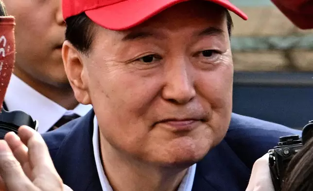 South Korea's ousted president Yoon Suk Yeol leaves his official residence in Seoul, South Korea, Friday, April 11, 2025. (Song Kyung Seok/Pool Photo via AP)