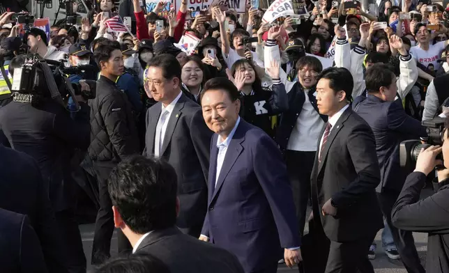 Recently ousted South Korean President Yoon Suk Yeol leaves the presidential residence in Seoul, South Korea, Friday, April 11, 2025. (AP Photo/Ahn Young-joon, Pool)