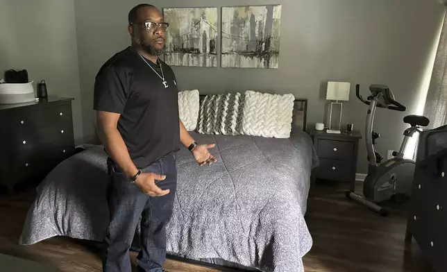 Toi Cliatt talks about the raid in the bedroom where he and then-girlfriend Trina Martin were sleeping when the FBI broke into their home, in Atlanta on Friday, April 25, 2025. (AP Photo/Sudhin Thanawala)