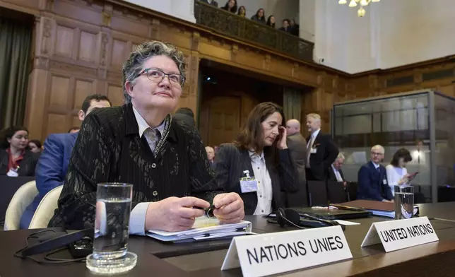 Elinor Hammarskjold, head of the UN legal team, waits to speak at the International Court of Justice, which opened hearings into a United Nations request for an advisory opinion on Israel's obligations to allow humanitarian assistance in Gaza and the West Bank, in The Hague, Netherlands, Monday, April 28, 2025. (AP Photo/Peter Dejong)