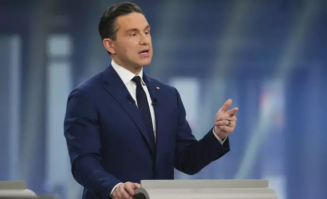 Conservative Leader Pierre Poilievre makes a point as he participates in the French-language federal leaders' debate, in Montreal, Wednesday, April 16, 2025. (Sean Kilpatrick/The Canadian Press via AP)