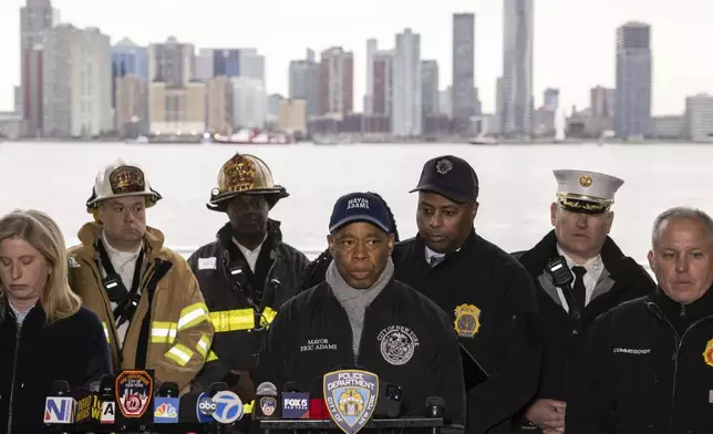 New York City Mayor Eric Adams speaks during a press conference at Pier 40, where a helicopter went down in the Hudson River between Manhattan and the New Jersey waterfront, Thursday, April 10, 2025, in New York. (AP Photo/Yuki Iwamura)