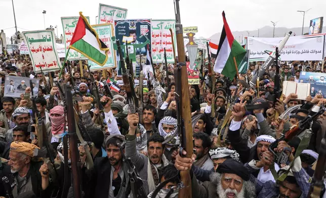 Houthi supporters chant slogans during a weekly, anti-U.S. and anti-Israel rally in Sanaa, Yemen, Friday, April 18, 2025. (AP Photo/Osamah Abdulrahman)