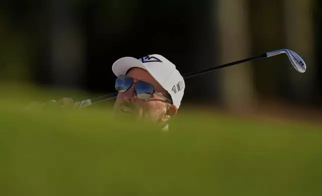 Phil Mickelson. chips to the green on the 18th hole during the second round at the Masters golf tournament, Friday, April 11, 2025, in Augusta, Ga. (AP Photo/Ashley Landis)