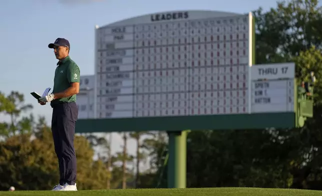 Jordan Spieth waits to play on the 18th hole during the second round at the Masters golf tournament, Friday, April 11, 2025, in Augusta, Ga. (AP Photo/Ashley Landis)