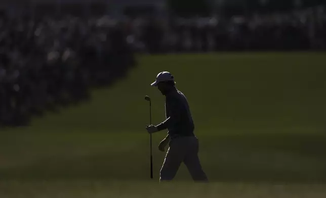 Russell Henley walks to the green on the first hole during the second round at the Masters golf tournament, Friday, April 11, 2025, in Augusta, Ga. (AP Photo/Matt Slocum)