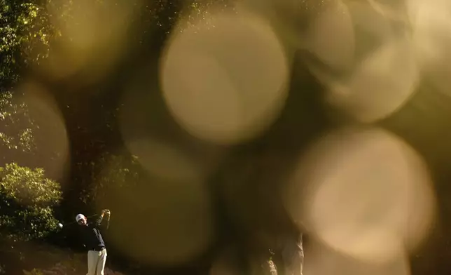 Nick Dunlap hits from the 11th tee during a practice round at the Masters golf tournament, Tuesday, April 8, 2025, in Augusta, Ga. (AP Photo/Julia Demaree Nikhinson)