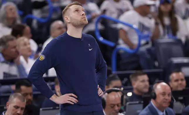 Memphis Grizzlies interim coach Tuomas Iisalo looks up during the first half in Game 1 of an NBA first-round playoff series against the Oklahoma City Thunder, Sunday, April 20, 2025, in Oklahoma City. (AP Photo/Nate Billings)
