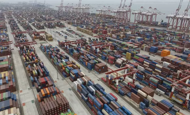 Shipping containers are seen ready for transport at the Guangzhou Port in the Nansha district in southern China's Guangdong province on Thursday, April 17, 2025. (AP Photo/Ng Han Guan)
